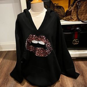 This sweater hoodie is so soft with muffler sequins lips that are perfect